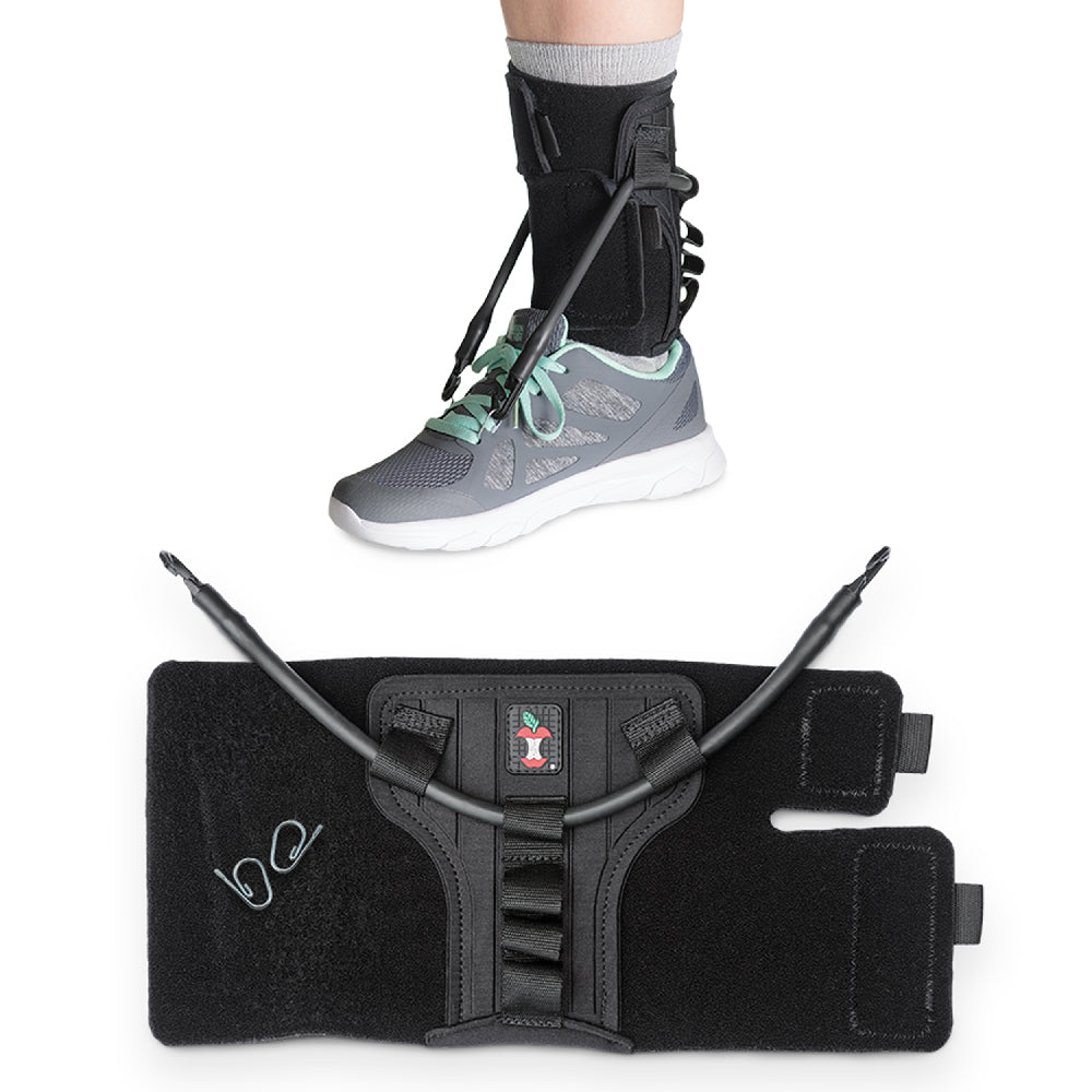 FootFlexor Ankle Foot Orthosis (AFO) shown both worn on a shoe and displayed flat. The brace wraps around the lower leg and foot, with elastic tension cords connecting the shin section to the shoe to help lift the foot during walking. Designed to assist with foot drop, improve gait, and provide ankle support while remaining lightweight and adjustable.